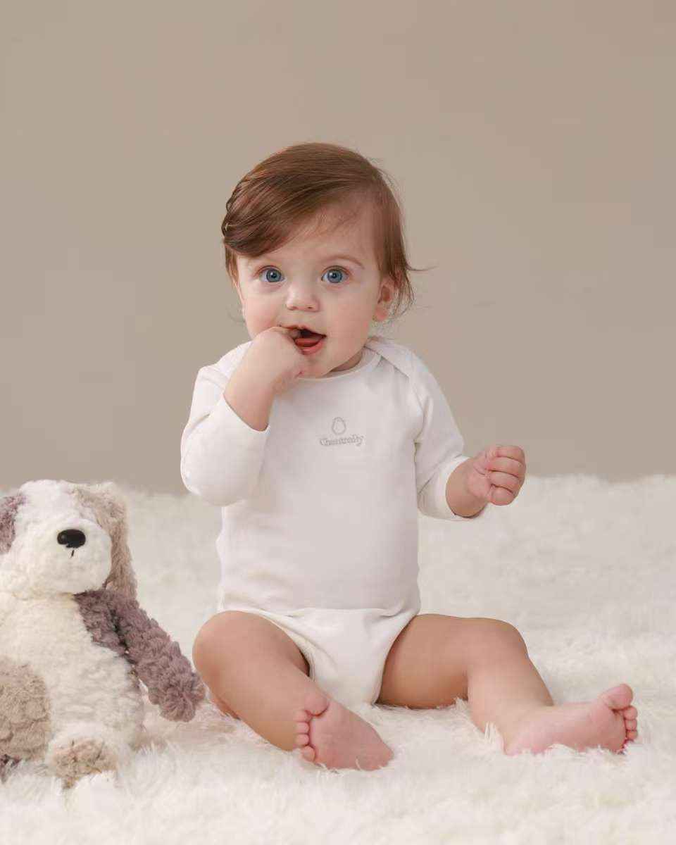 Signature Innocent Long Sleeve Bodysuit