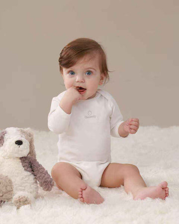 Signature Innocent Long Sleeve Bodysuit